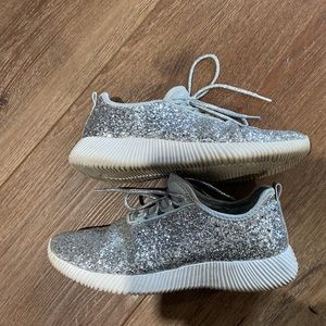 Woman’s silver sparkle shoes